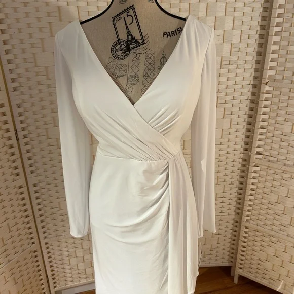 Long sleeve white jersey dress with side draping. NWT Size 12. - Picture 2 of 6